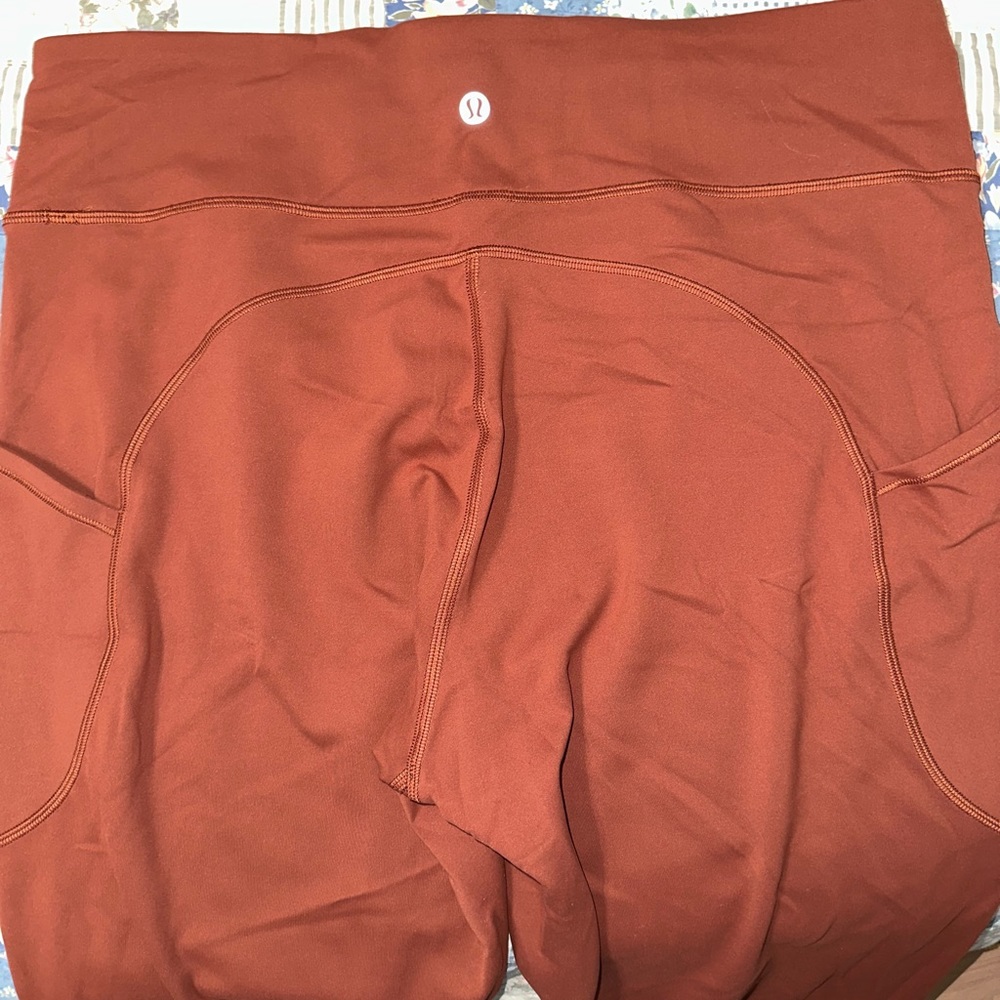 Lululemon size 14 rust colored yoga workout exercise pants